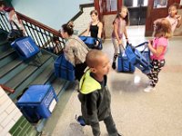 John B. Devalles elementary school  students bring bags containing breakfast to their classmates as students across New Bedford return to school.  [ PETER PEREIRA/THE STANDARD-TIMES/SCMG ]